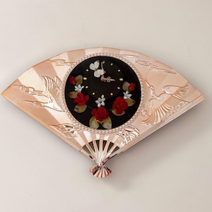 May include: A set of three ceramic mugs with a speckled, matte finish in cream, light grey, and dark grey. Each mug has a simple, minimalist design and a rounded handle.