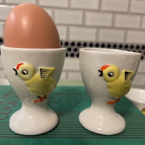 A pair of single white porcelain egg cups with chickens, farmhouse decor, country kitchen,  holiday brunch