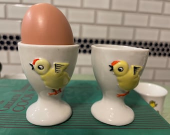 A pair of single white porcelain egg cups with chickens, farmhouse decor, country kitchen,  holiday brunch