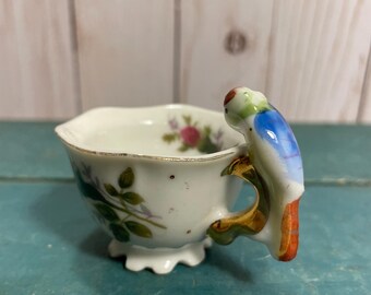 Tiny tea cup with parrot handle, made in Japan