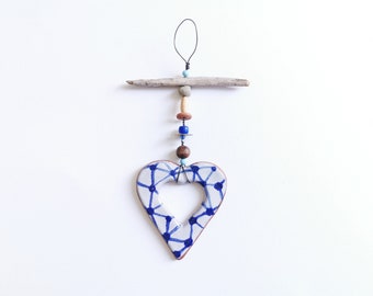 Blue and white hanging ceramic heart; pottery and driftwood ornament; coastal; unique gift; seaside; nautical decor; rustic; folk; beach hut