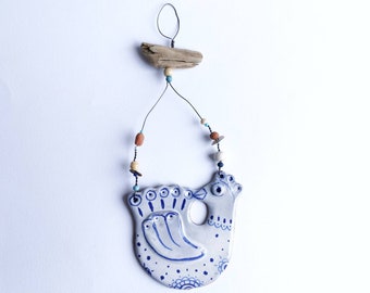 Driftwood; ceramic bird; hanging decoration; coastal pottery; blue and white; driftwood; happy hen; unique gift; rustic decor; seaside style