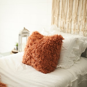 Orange shag clearance pillow