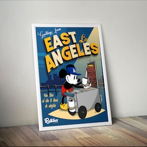 May include: A vintage-style postcard featuring Mickey Mouse dressed in a Los Angeles Dodgers baseball cap, selling tacos from a street cart. The postcard reads "Greetings from East Los Angeles" and "Un Taco al dia te llena de alegria".
