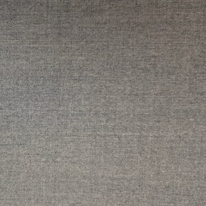 May include: A close-up of a gray textured fabric with a subtle sheen. The fabric has a fine weave and a slightly rough texture.