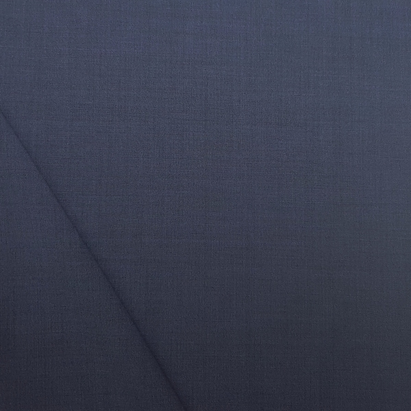 Tissu en laine mérinos pour costumes et pantalons. Couleur bleu denim. Pure laine mérinos super 120'S, tissu haute performance, fabriqué par Reda (Italie)