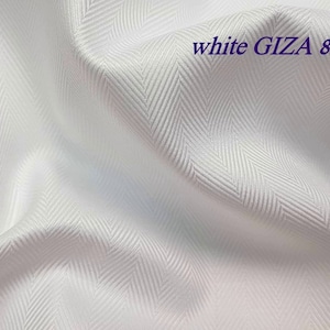 Shirting fabric in white and light cyan ,luxurious  twill, oxford, herringbone weave , 100 % egyptian cotton Giza 87 by Thomas Mason