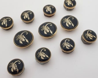 Metal blazer scorpio sign shank buttons set. In gold and nickel on deep-blue enamel ground , high resolution, perfect quality, made in Italy