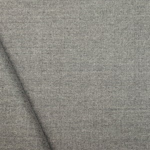 May include: Close-up of a gray textured fabric with a subtle woven pattern.