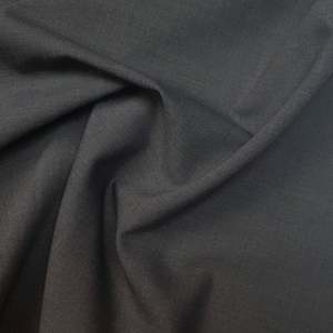 Merino wool suiting fabric. Middle gray color. Pure merino wool super 120&#39;S, high performance fabric, made by Reda ( Italy)