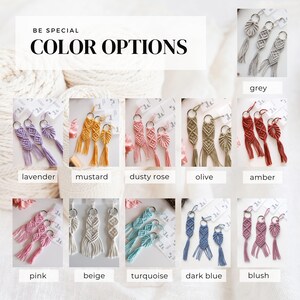 May include: A collection of 10 macrame keychains in various colors, including lavender, mustard, dusty rose, olive, amber, pink, beige, turquoise, dark blue, and blush. Each keychain features a small, intricate macrame design with a tassel.