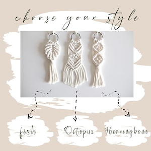 May include: Three white macrame keychains with different patterns: fish, octopus, and herringbone. The keychains are hanging from silver rings.