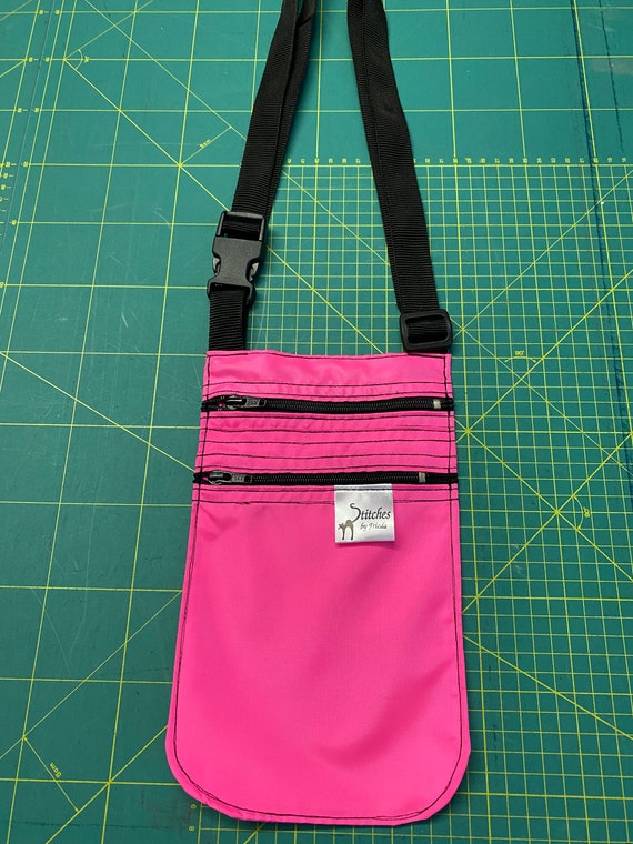 Crossbody bag bright pink lightweight waterproof, dog walking bag, double zip crossbody bag, adjustable crossbody bag, small shoulder bag