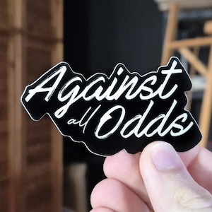 Contra todas as probabilidades v2 | Adesivo Premium | Vinil 3''x2'' | Arte com caneta e tinta | Citação inspiradora | Desenho desenhado à mão