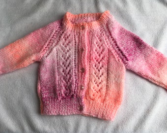 Baby cardigan. Hand made pink baby cardigan. Pretty pink random baby cardigan. Second size.