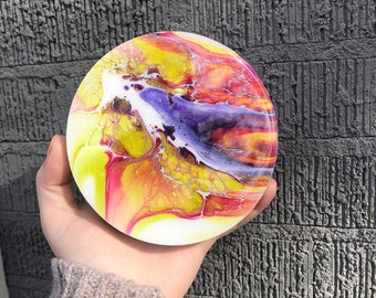 Acrylic pour painting coated In resin
