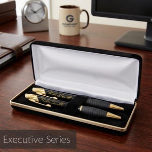 May include: A set of three ceramic vases in varying heights and shapes. The vases are glazed in a matte white finish, offering a minimalist aesthetic. The tallest vase is approximately 10 inches high.