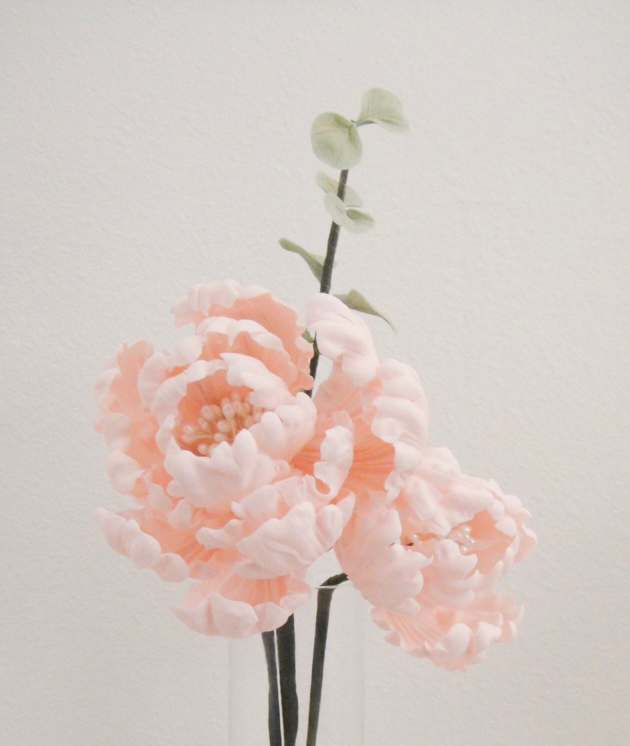 Baby pink closed peony edible flower cake topper