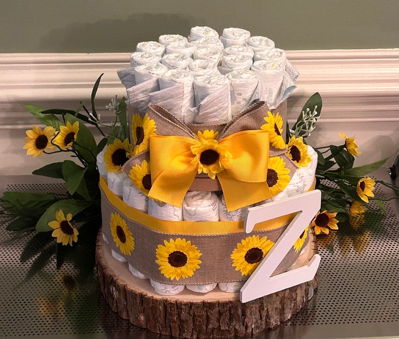 Sunflower Diaper Cake, Baby shower centerpiece, Sunflower baby shower, Diaper cakes for Girls, What will it bee baby shower decor image 2