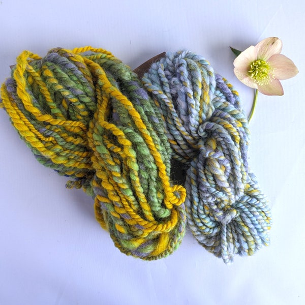 Lilac,green and yellow handspun spring art yarn for weaving textile and fiber crafts.