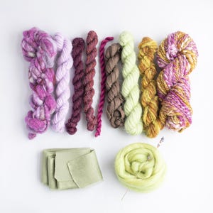 Vintage green and purple hand-spun yarn bundle for weaving, textile and fibre bundles.