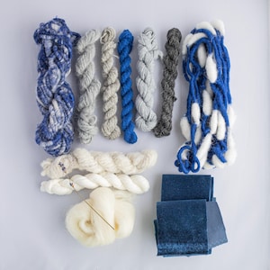 Royal blue ,grey , white yarn bundle for weaving, textile and fibre bundles.