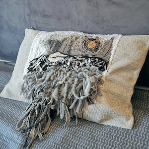 Handwoven tapestry on a cusioncover.