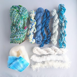 Ocean-inspired art-yarn bundle for weaving, textile and fibre crafts.