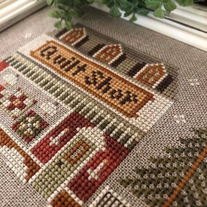 Quilt Shop includes 2 buttons by Sara Counted Cross Stitch PatternChart Christmas Avenue