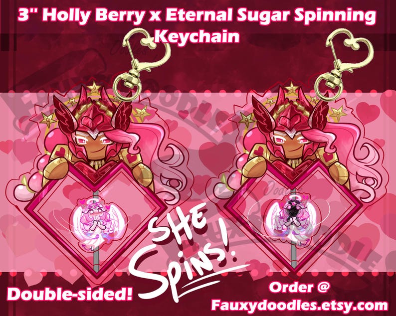 May include: Double-sided keychain featuring a pink and gold character holding a heart-shaped emblem. The emblem has a spinning design inside. The keychain is 3 inches (7.6 cm) in size and has a heart-shaped clasp.