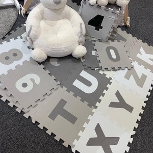 grey and white playmats