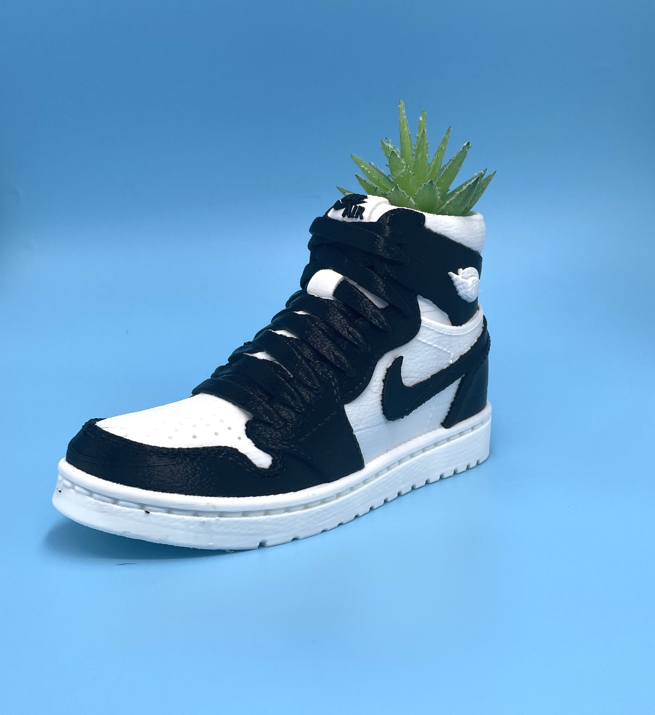Teal nikes hotsell with flowers