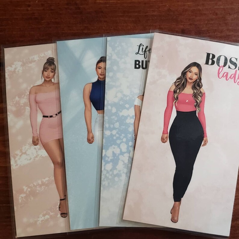 May include: Four different printable cards featuring illustrations of women in various outfits. The cards have different backgrounds and text. The text on the cards reads "Life But Better" and "Boss Ladies".