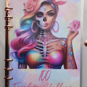 May include: A colorful illustration of a woman with a sugar skull face and rainbow hair. The image is on a pink and blue background with the text "100 Envelope Challenge".