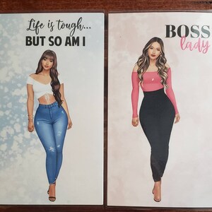May include: Two cards with illustrations of women. The first card has a blue background with white text that reads "Life is tough... BUT SO AM I". The second card has a pink background with black text that reads "BOSS lady".