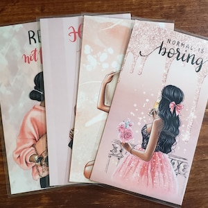May include: Four pink and white illustrated cards with a woman in each. The cards have the text "Rebel not follow", "Hope", "Normal is boring", and "Hope".
