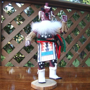 SW Native American hand-made Kachina doll.  Standing 7inches tall this Kachina is "Mudman".  He is beautifully crafted by hand by A. Largo.