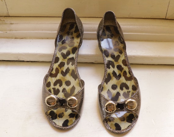 Sandali store bassi leopardati