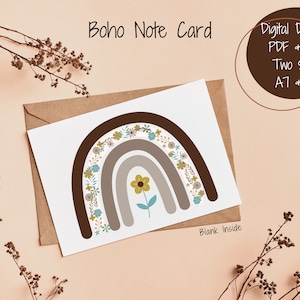 May include: A printable boho note card featuring a rainbow with brown, gray, and beige stripes, decorated with blue and yellow flowers. The card has a blank inside and is available in two sizes: A7 and A2.