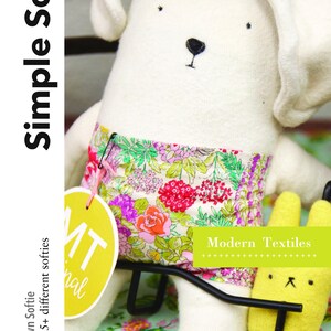 May include: A white stuffed bunny with floral fabric shorts sits on a floral fabric background. The bunny has black embroidered eyes and a nose. The text "Simple Softie" and "Modern Textiles" is visible in the image.
