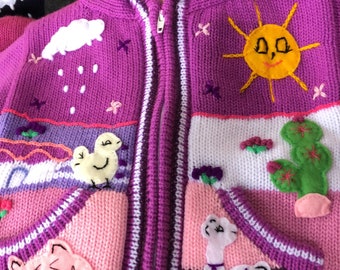The cutest hand applique/hand embroidered stories on Kids Sweaters
