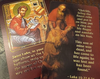 St. Luke Holy Card with Gold Foil Border. It is 2.75" x 4.25"with rounded corners