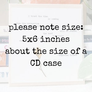 May include: A white card with text that reads "I trust the time is coming" and "please note size: 5x6 inches". The card is about the size of a CD case.