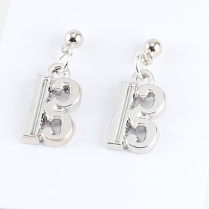 Alto clef charm earrings