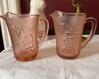 Vintage Pink pressed glass creamers Pair Depression glass milk pitchers KIG Indonesia grapes pattern 5 inch high