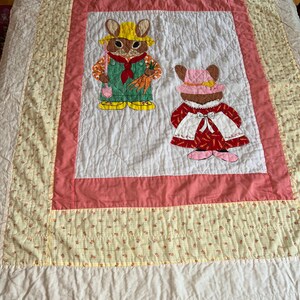 Vintage Children’s handmade Quilt 40” x 52” featuring rabbit characters
