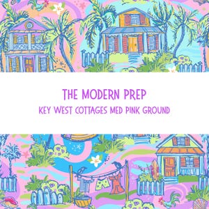 May include: A colorful pattern featuring Key West cottages, palm trees, and laundry hanging on a clothesline. The design includes the text "THE MODERN PREP" and "KEY WEST COTTAGES MED PINK GROUND" on a pink background with blue, green, and purple accents.