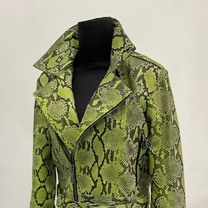 May include: A green snakeskin-patterned leather jacket with a zip fastening and a belt at the waist.