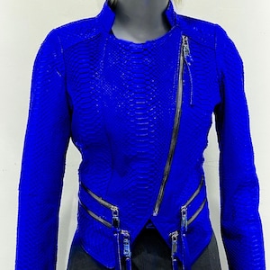 May include: A bright blue leather jacket with a snakeskin pattern and multiple zipper closures.