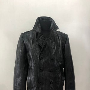 May include: A black double-breasted peacoat made of snakeskin.